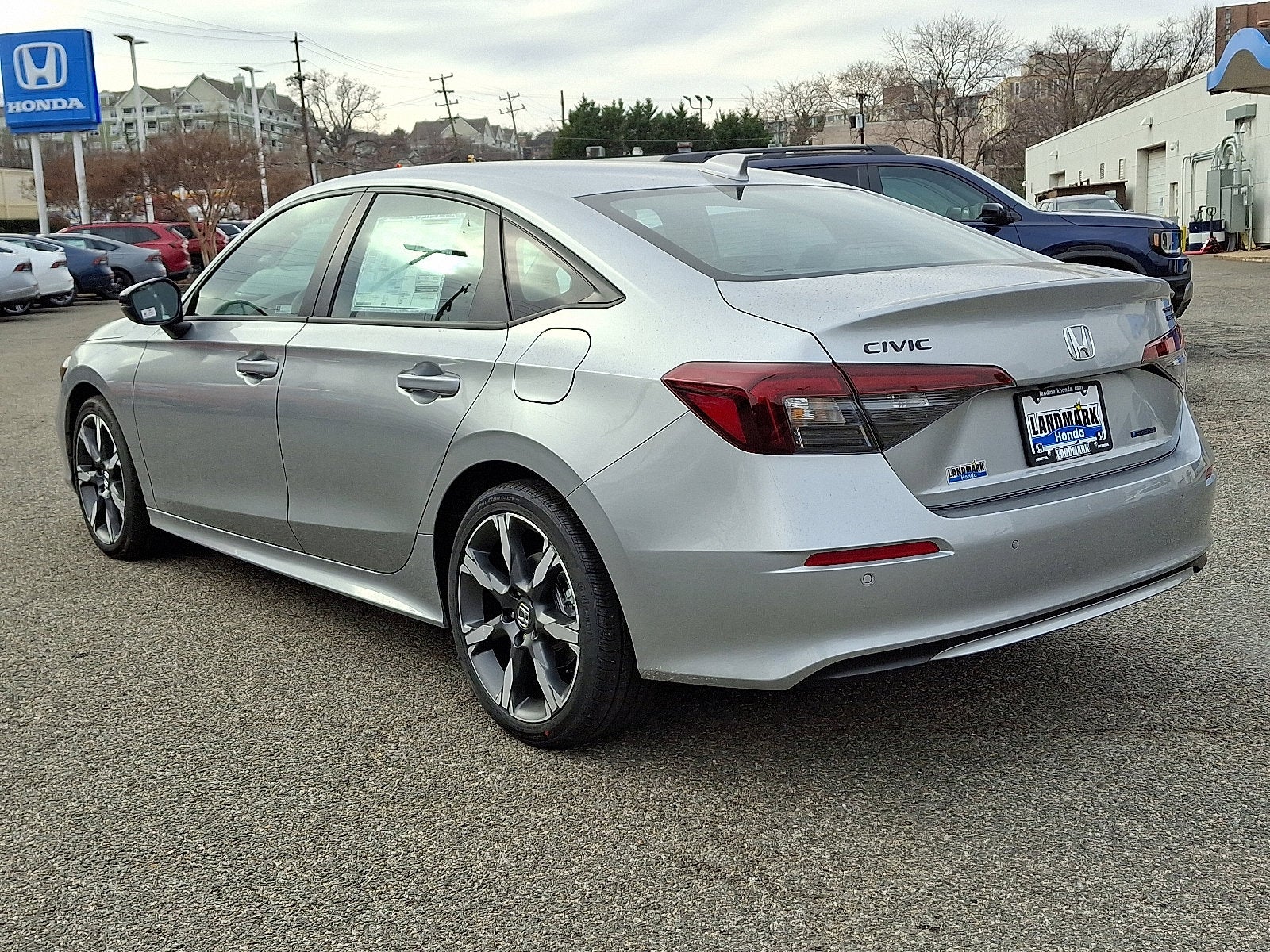 2026 Honda Civic Sedan 2WD Sport Touring Hybrid