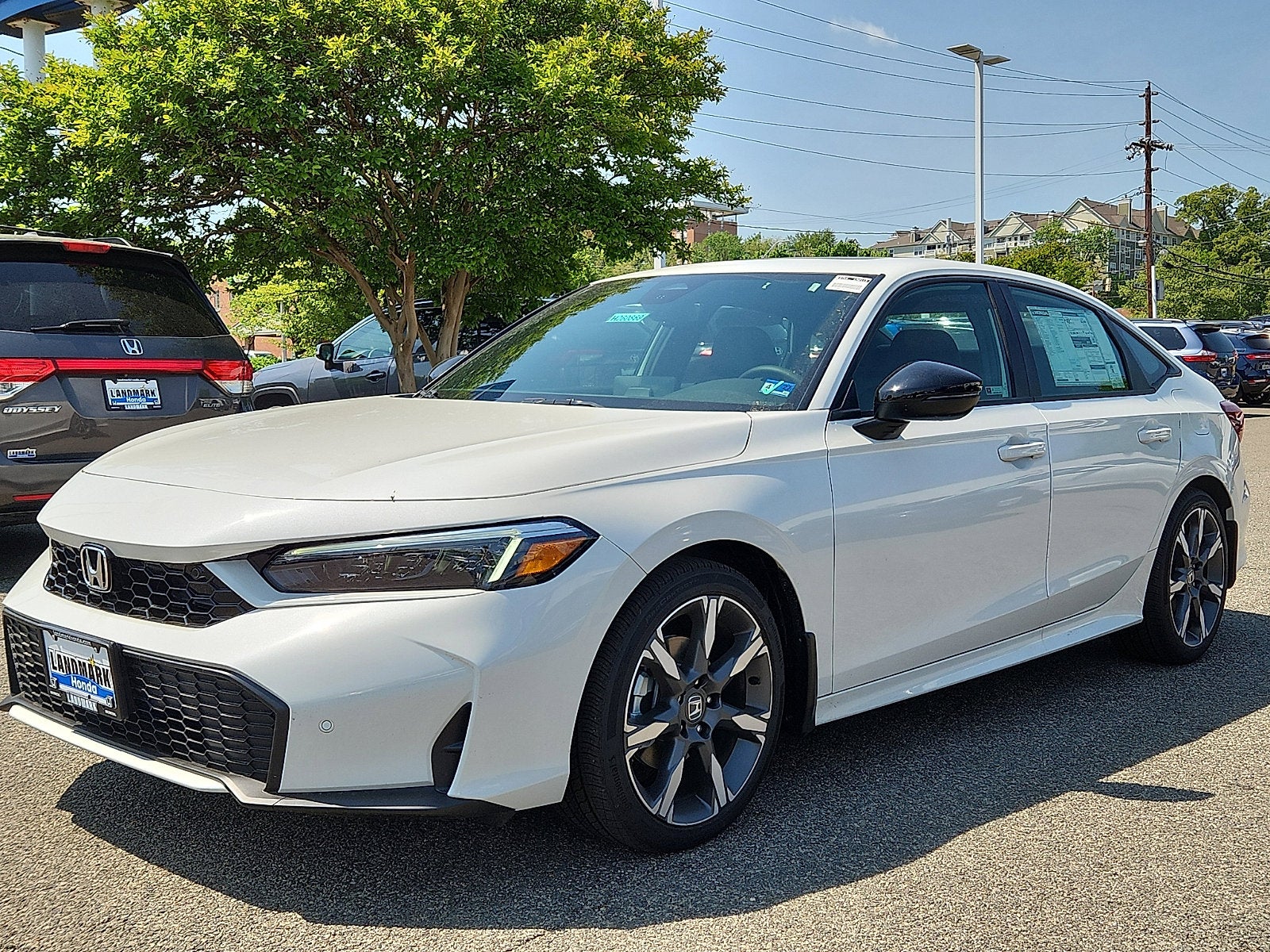 2026 Honda Civic Sedan 2WD Sport Touring Hybrid