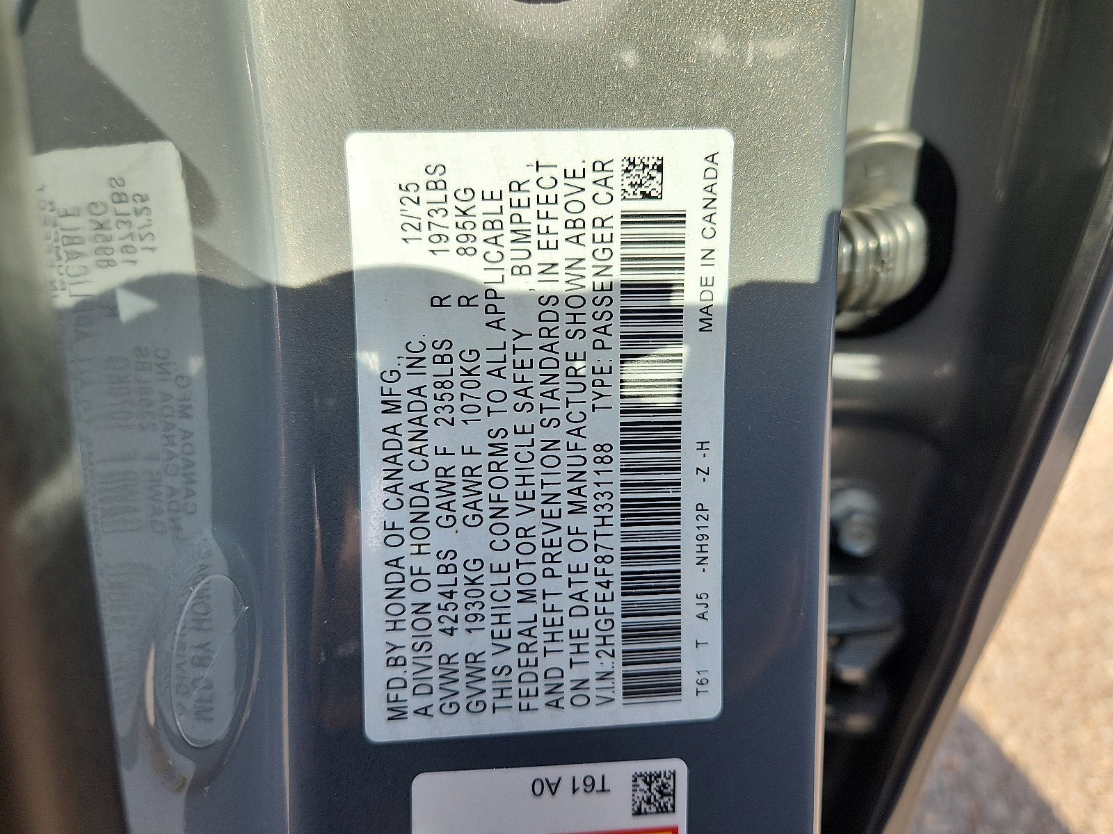 2026 Honda Civic Sedan 2WD Sport Touring Hybrid