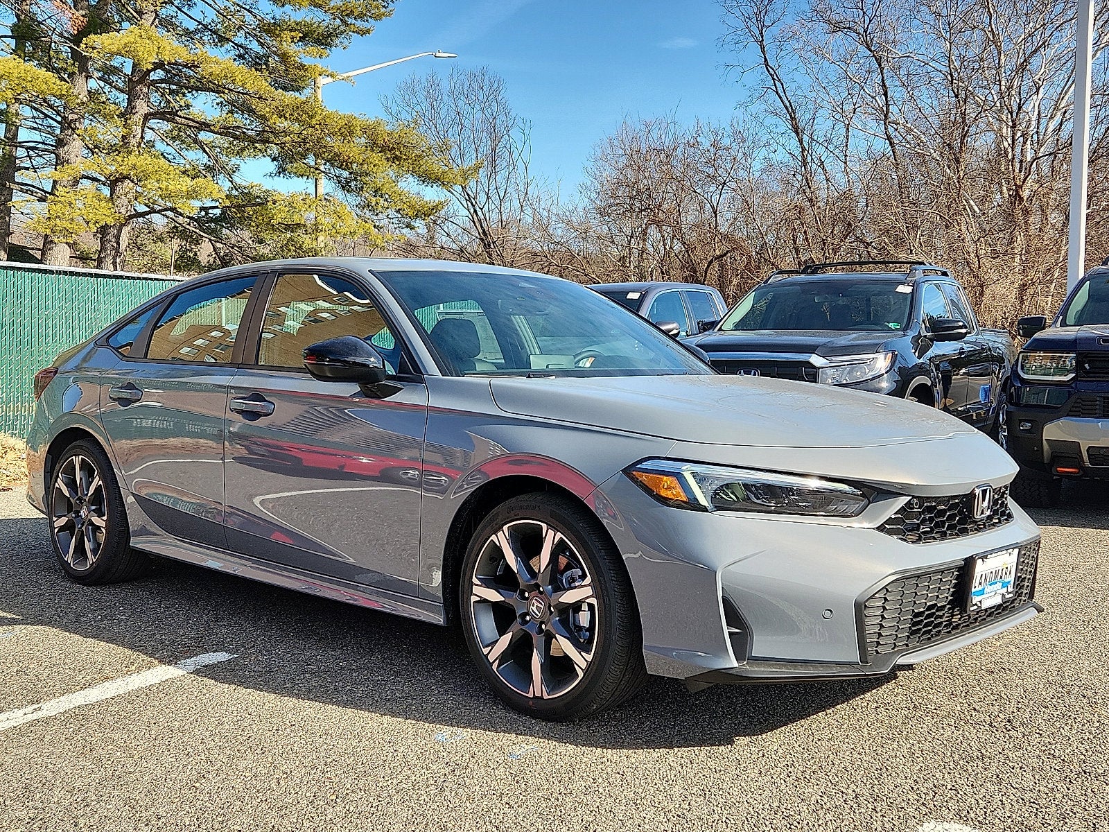 2026 Honda Civic Sedan 2WD Sport Touring Hybrid