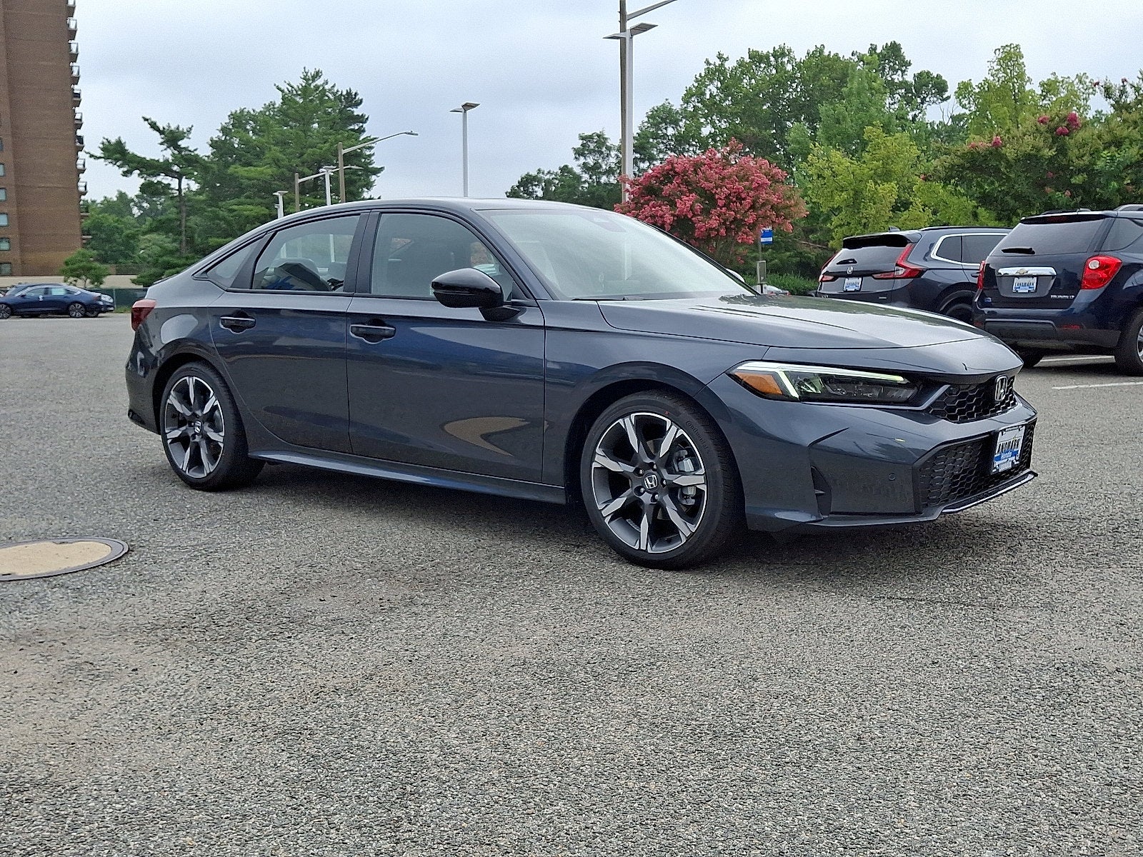2026 Honda Civic Sedan 2WD Sport Touring Hybrid